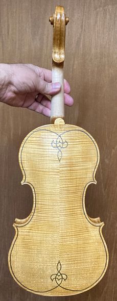 Yellow base coat on 5-string fiddle handmade of European woods, handcrafted in Oregon by Artisanal Luthier, Chet Bishop