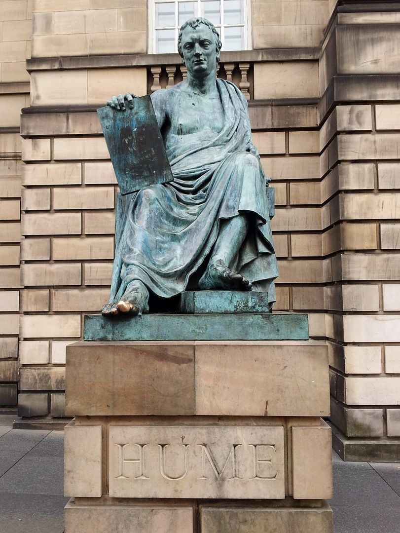 Photo of the famous David Hume statue outside the High Court on the Royal Mile, Edinburgh, UK. Taken by the author in 2012.