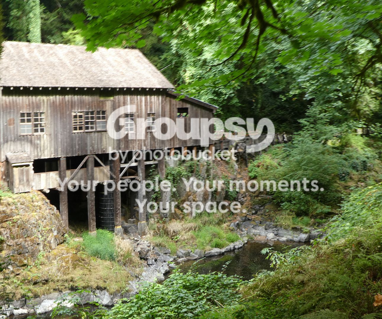 Cedar Creek Grist Mill: The outside of the mill and the bridge (photo ...