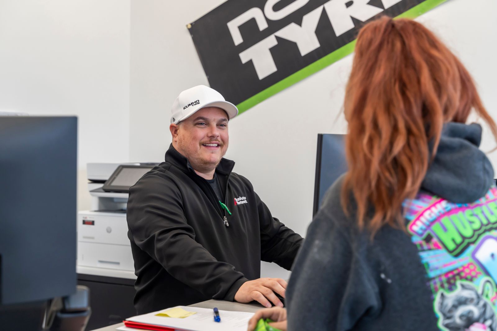Plaza Tire Service Belleville ribbon cutting