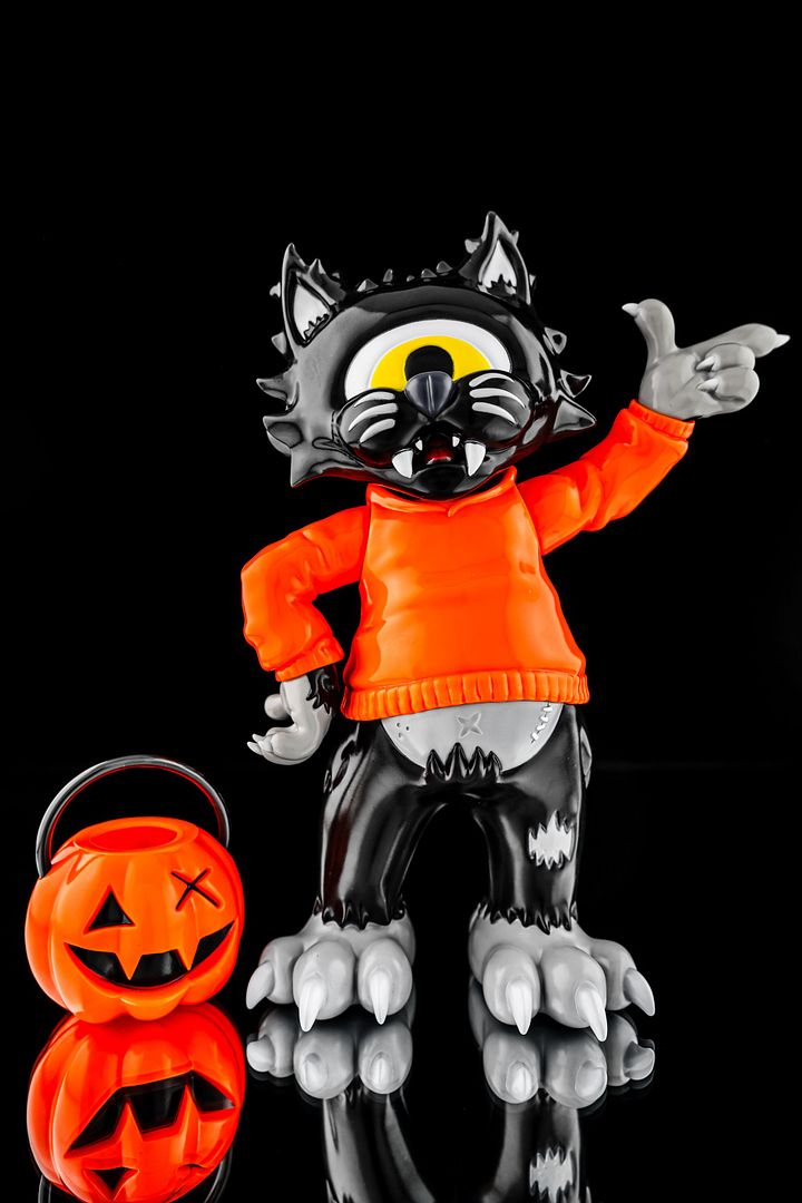 Initium Spooky black and grey cat in orange hoodie with pumpkin trick-or-treat pail