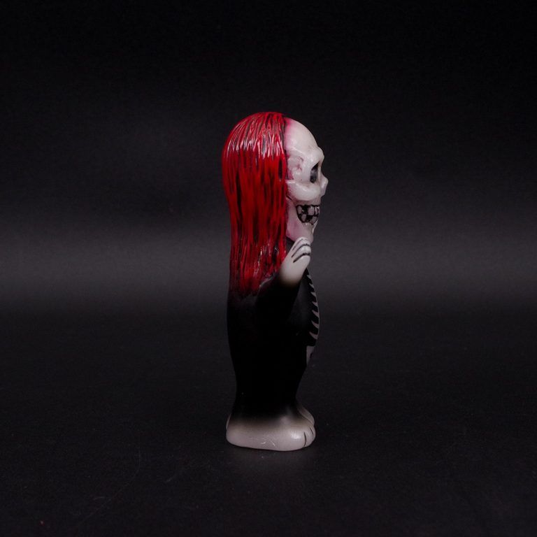 Ghost Dog side view showing its red hair and compact body