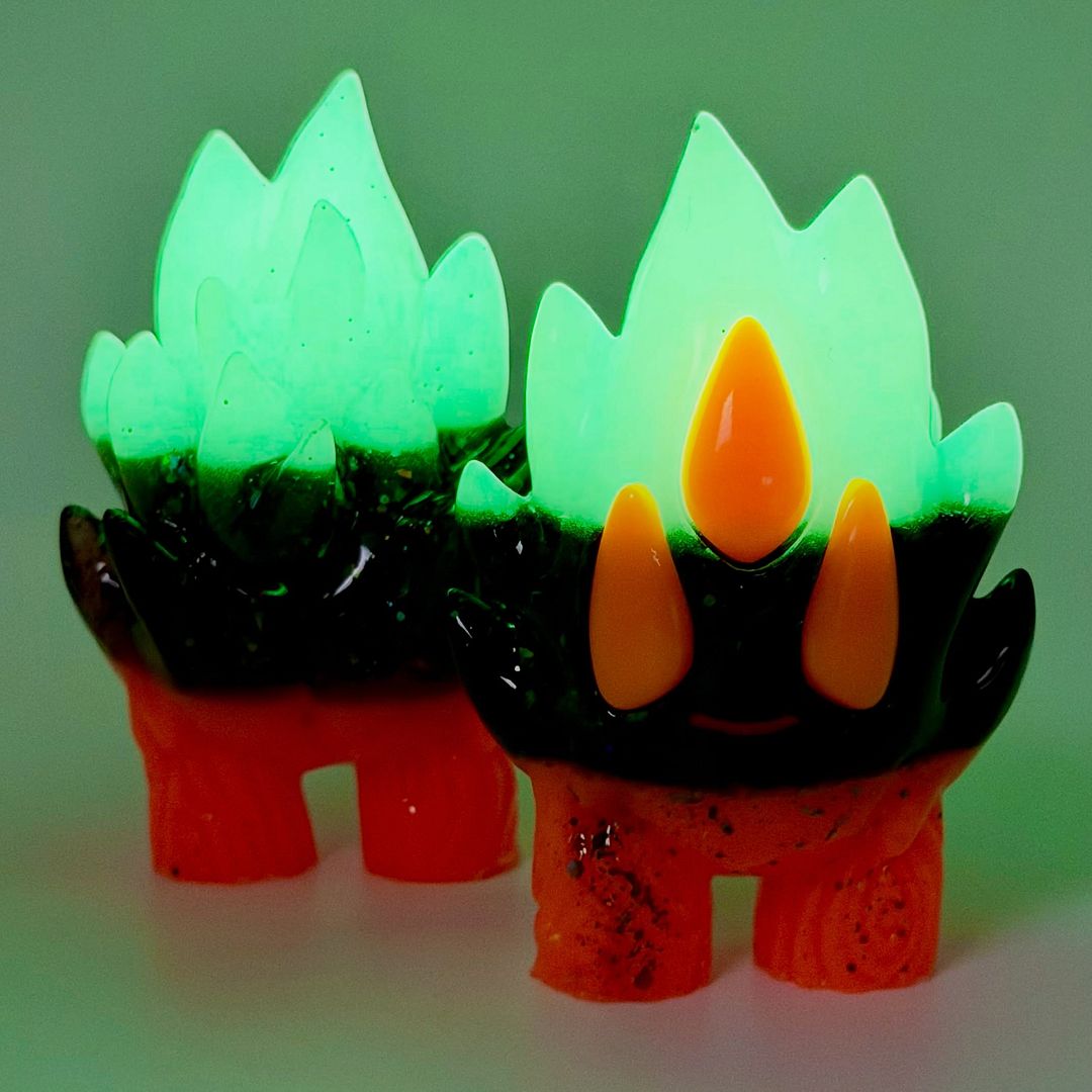 TriBlaze Spark Candy Corn edition with its flames glowing green in the dark