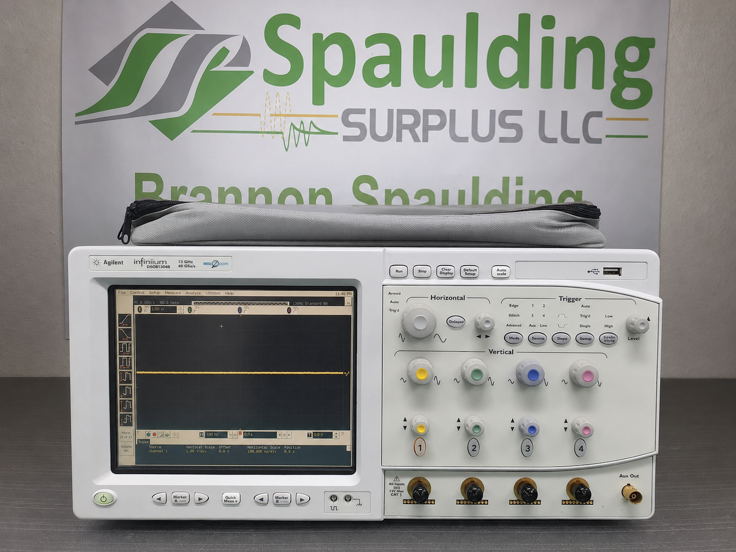 Agilent Infiniium DSO81304B oscilloscope with Spaulding Surplus banner