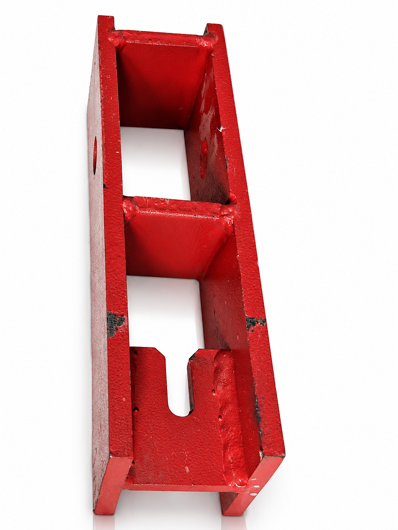 Red steel bracket showing paint wear