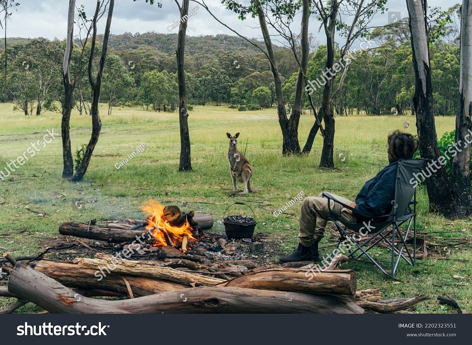 stock-photo-man-at-campfire
