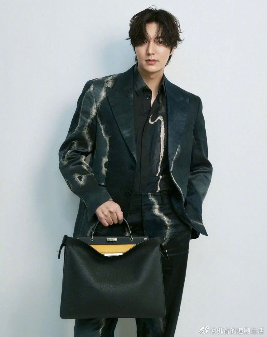 Lee Min Ho Pulls Off Shiny Dark Green Fendi Suit and Briefcase Look in New Pictorial