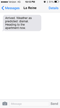 Text from Cat to Kara noting she's arrived and the weather is dismal and that she's heading to her Paris apartment