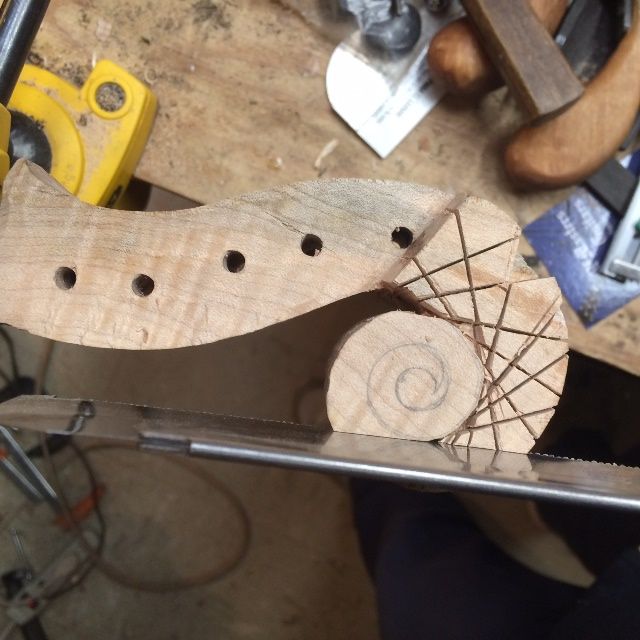Sawing to create the profile of the scroll on the 15" Five-string viola.