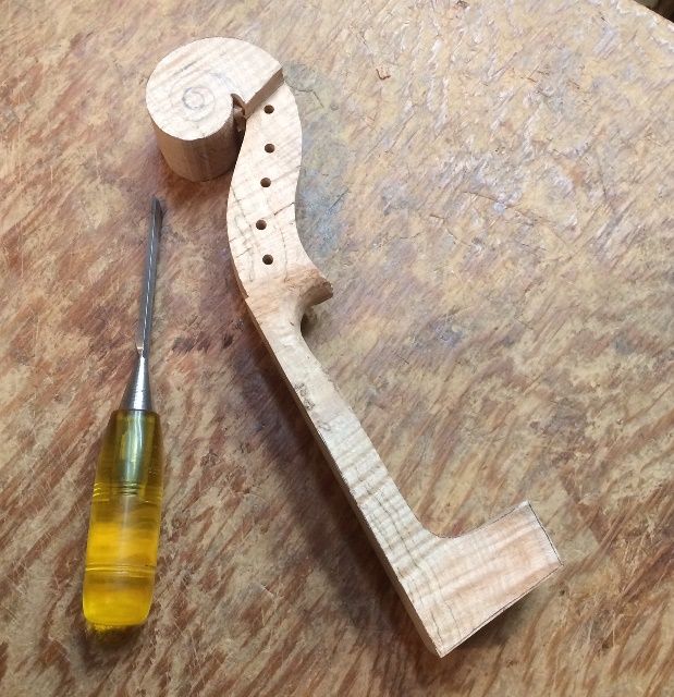 Beginning the scroll of a Five String viola.