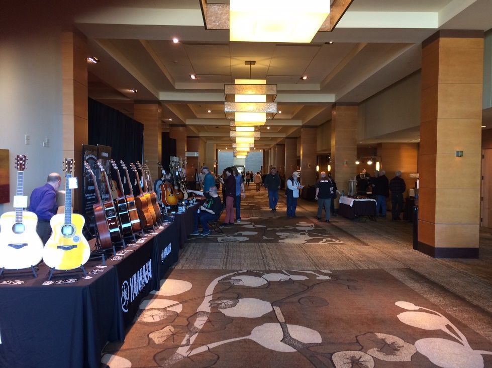 Dealers' Hall, before the show opened: our guitars and five-string fiddles were apparently the only handmade instruments in the hall.