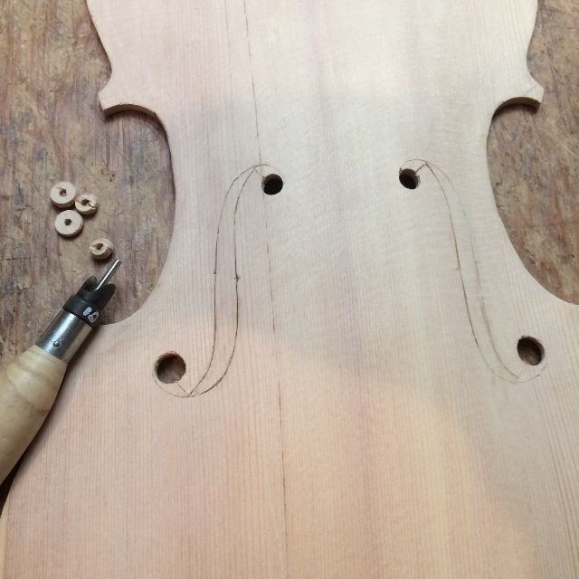 Five String viola front plate with F-hole cutter work completed.