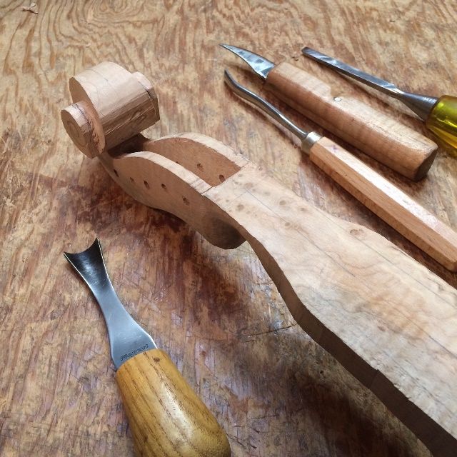 Carving the pegbox for the scroll of the 15" Five-string viola.