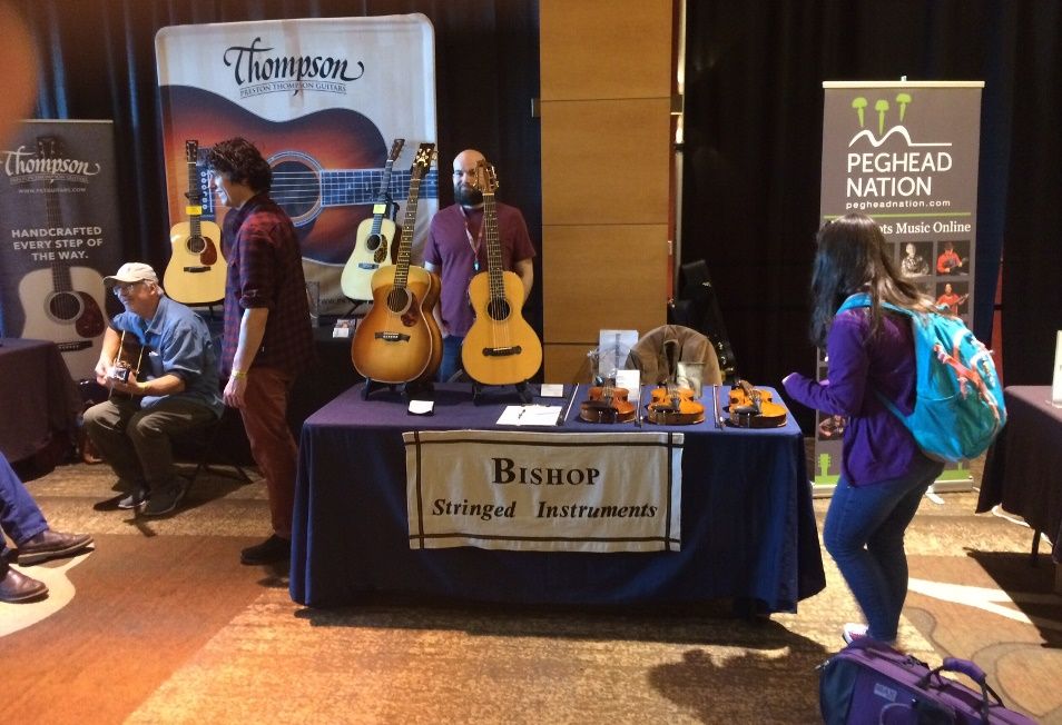 One little table fro two makers of guitars and five-string fiddles.