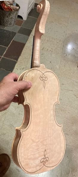 Bare wood back of five string handmade bluegrass fiddle handcrafted in Oregon by artisanal luthier Chet Bishop