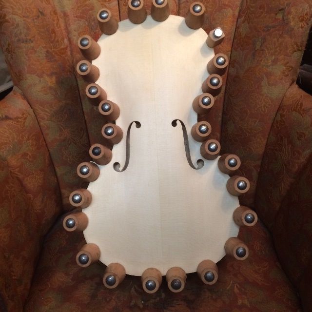 Front plate of the 16-1/2" five-string Viola installed, glued and clamped to the garland.