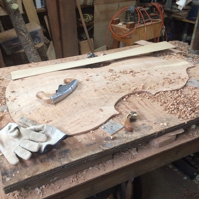 Arching of the back-plate for a five-string double bass still in progress.
