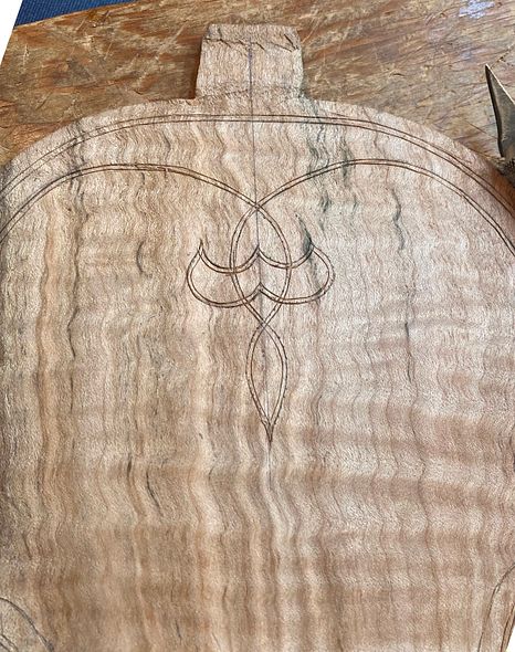 Beginning the purfling weave on the back plate of a 5-string fiddle handcrafted in Oregon by Chet Bishop, artisanal Luthier.