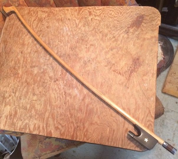 Completed double Bass bow, minus windings and hair.