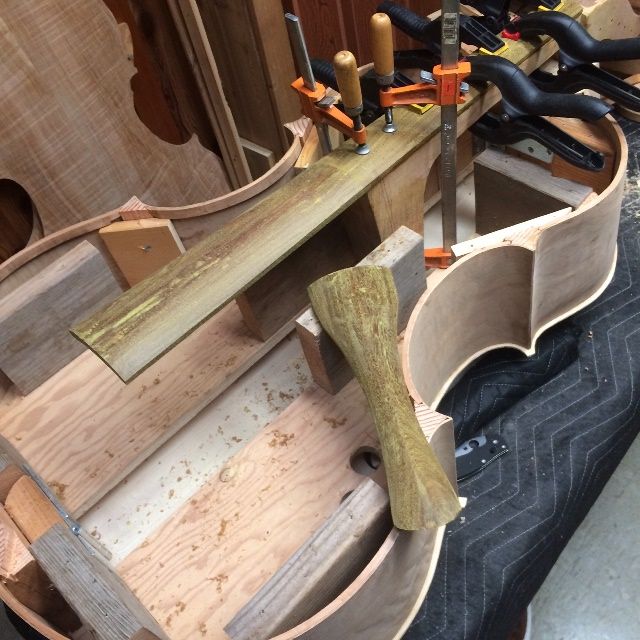 Fingerboard and tailpiece for five-string double bass.