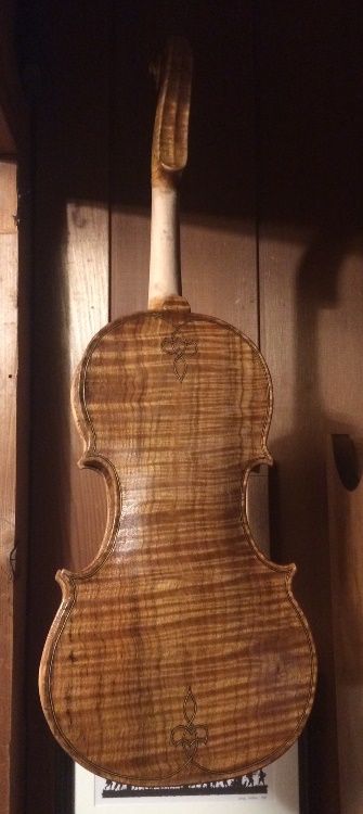 varnishing a 5-string bluegrass fiddle handmade in Oregon by Chet Bishop