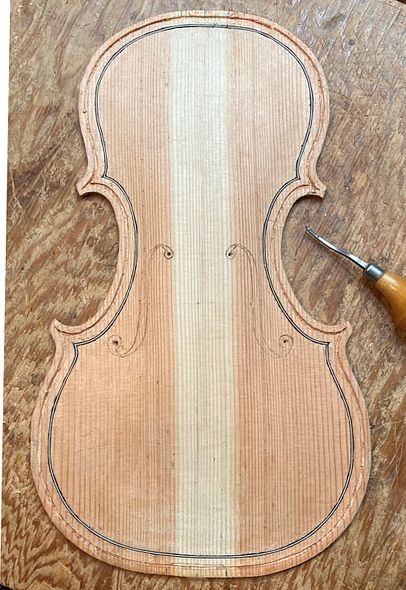 Inner line of purfling completed.