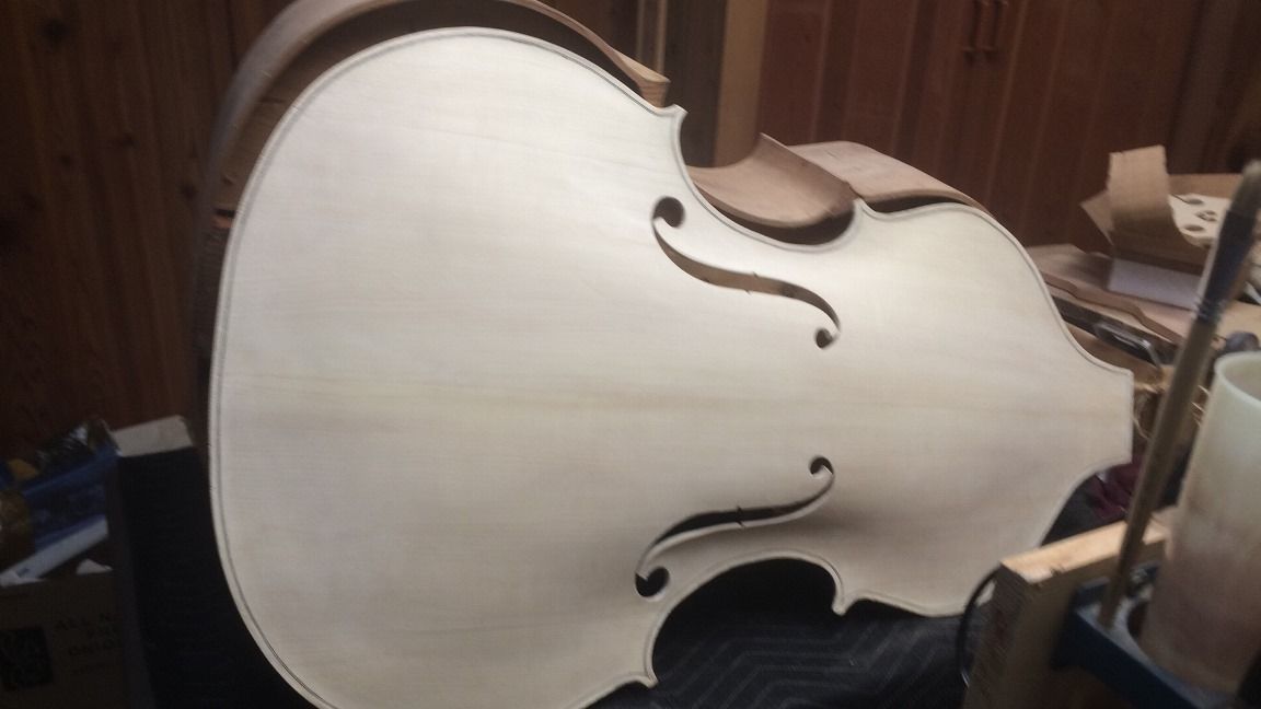 Front plate and Garland for a five-string double bass, ready to be joined.