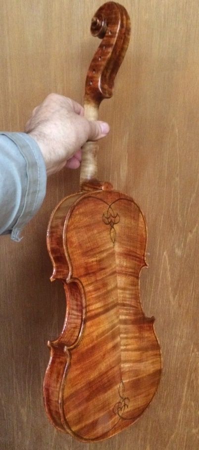 Back view of handmade 5-string fiddle made of Oregon Big Leaf Maple.