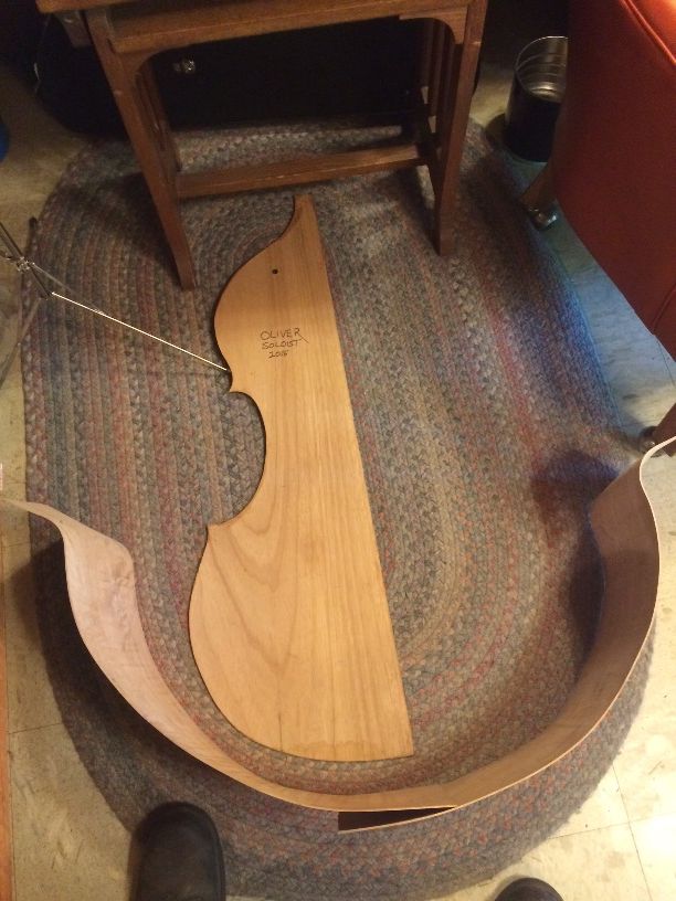 Lower ribs bent to approximate the mold shape of the 5-string double bass.
