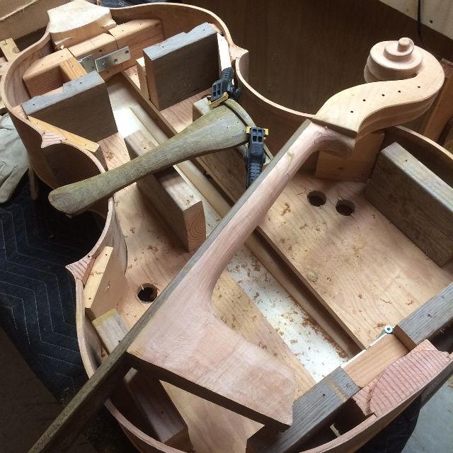 Neck and tailpiece for five-string double bass.