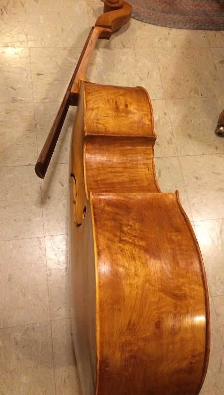 New fingerboard on five string double bass.