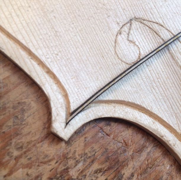 inserting purfling in a 5-string bluegrass fiddle front plate, handmade in Oregon by Chet Bishop