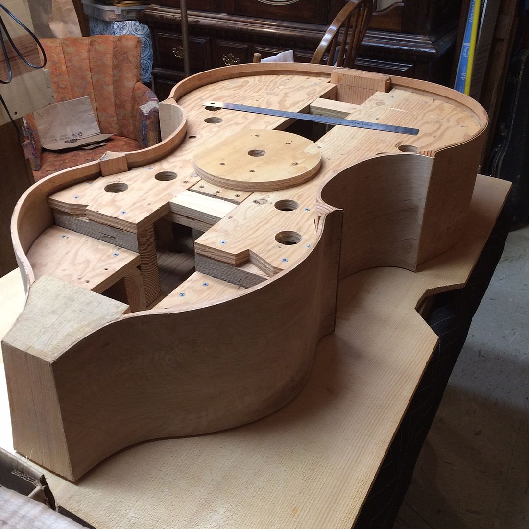 Ready to trace the shape of the front plate of the five-string double bass.