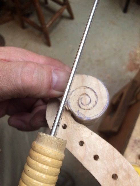 sawing out scroll on 5-string bluegrass fiddle handmade in Oregon by Chet Bishop, luthier.