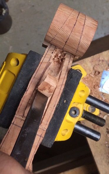 carving pegbox for five string bluegrass fiddle handmade in Oregon my Chet Bishop, luthier.