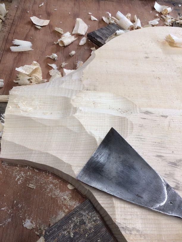 Sculpting the front plate arch for a five-string double bass.