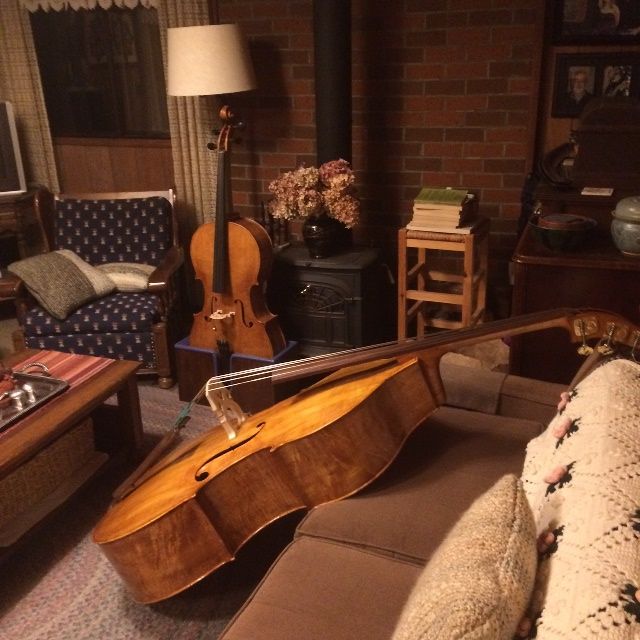 Completed 5-string double bass with cello in the background