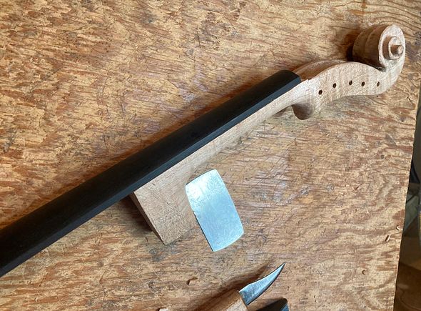 scroll with fingerboard