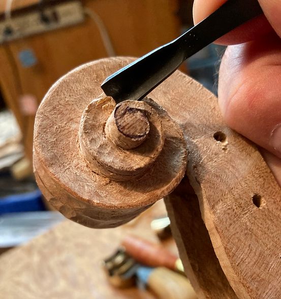 carving a five string fiddle scroll for a five-string bluegrass fiddle handmade in Oregon by Chet Bishop, Luthier.