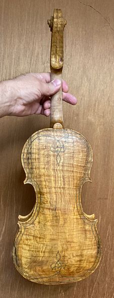 Yellow base coat on back side of 5-string commissioned instrument, handmade in Oregon by artisanal Luthier, Chet Bishop.