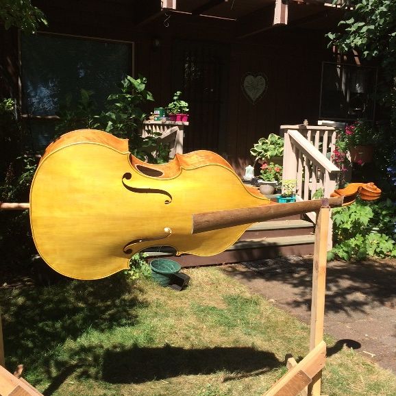 yellow base coat on five-string double bass.