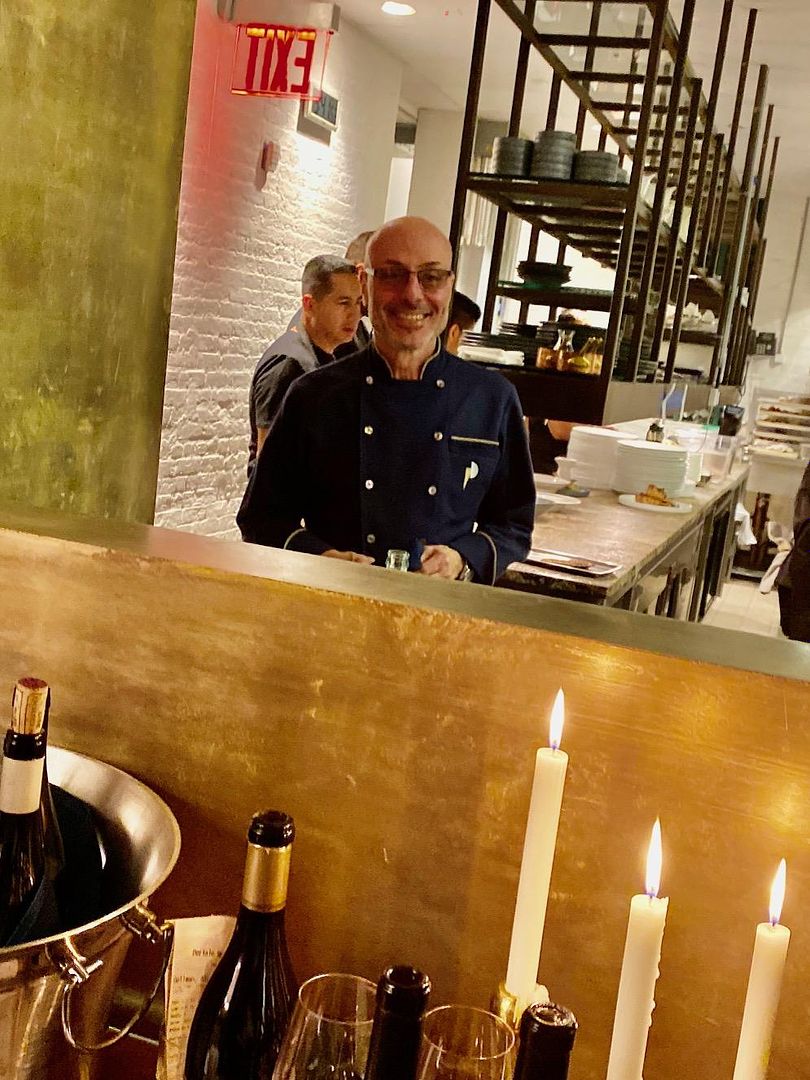 Alfred Portale can be seen moving in and out of the kitchen at his new restaurant.