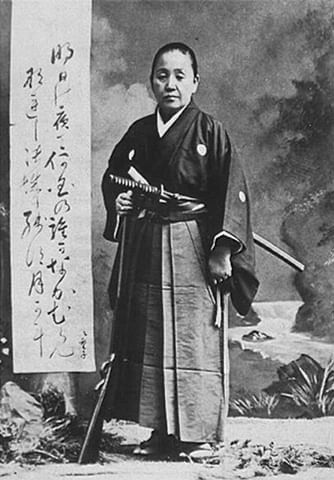 12 - Yamamoto Yae and the warriors of Aizu, 1868 Yae_old_with_rifle