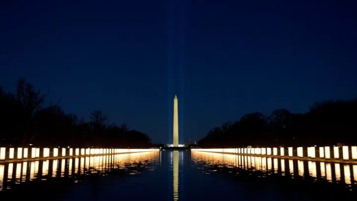 Libcoln_Memorial_Reflecting_Pool_Candles_courtesy_of_the_Net