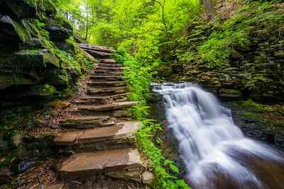 Stone staircase and waterfall at Ricketts Glen State Park