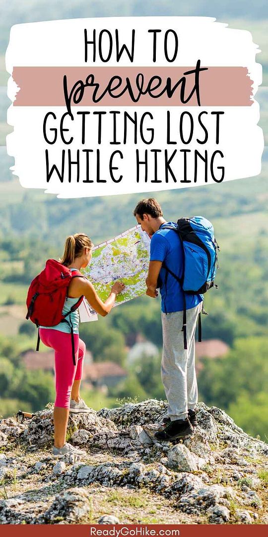 Picture of young couple looking at map while hiking on the mountain with text overlay How to Prevent Getting Lost While Hiking