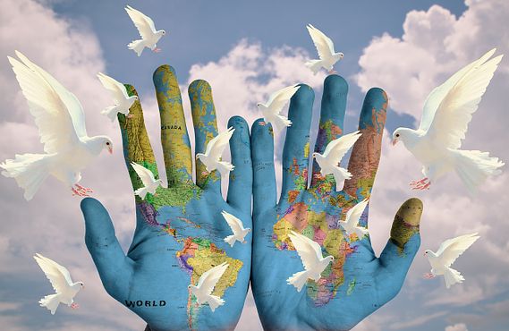 WORLD HANDS DOVES PEACE