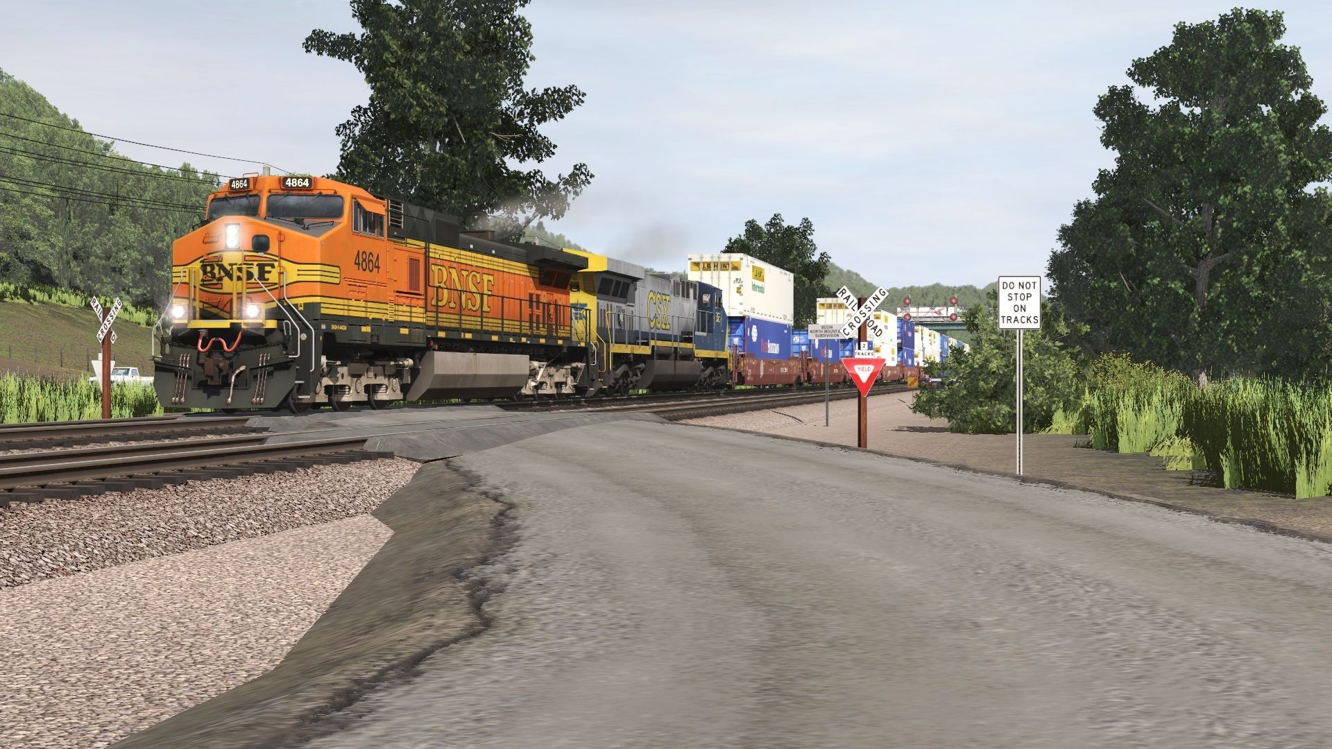 A-southbound-intermodal-train-blasts-downhill-into-town-behind-a-pair-of-GE's..jpg