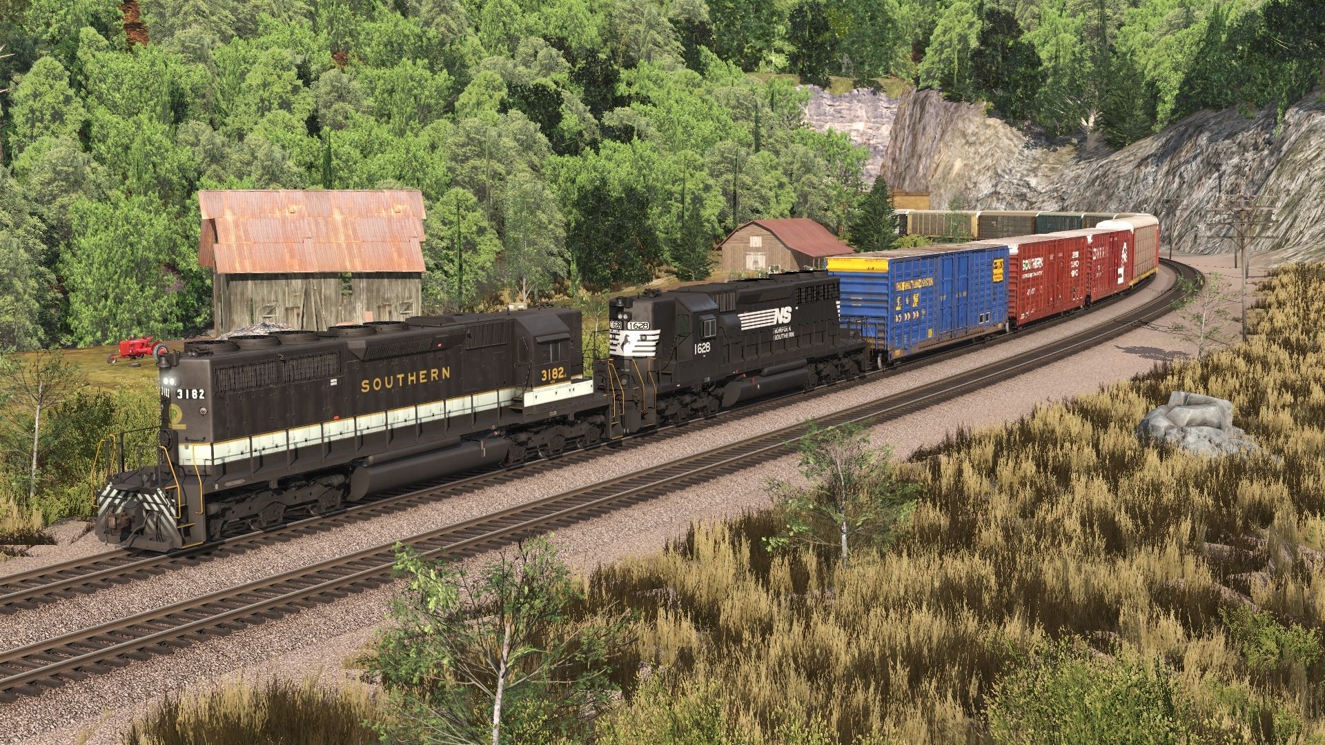 A-southbound-vehicle-train-crests-the-grade-at-the-famous-curve-at-Hilltop.-The-lead-SD40-2-still-sports-its-Southern-_Tuxedo_-paint..jpg
