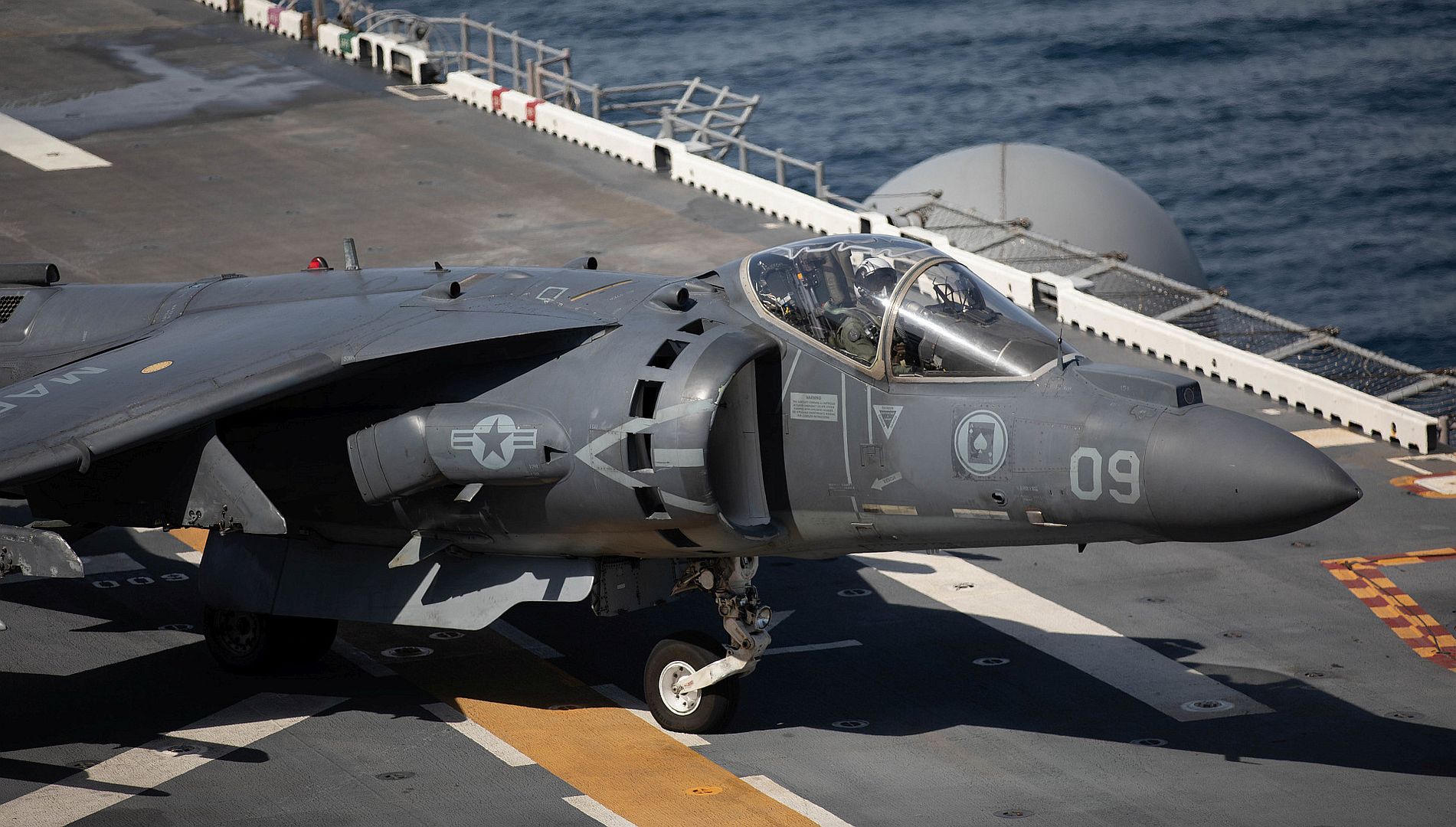 8B Harrier Assigned To The Marine Attack Squadron 231 Maneuvers On The Flight Deck Of The Amphibious Assault Ship USS Bataan 8B Harrier Assigned To The Marine Attack Squadron 231 Maneuvers On The Flight Deck Of The Amphibious Assault Ship USS Bataan